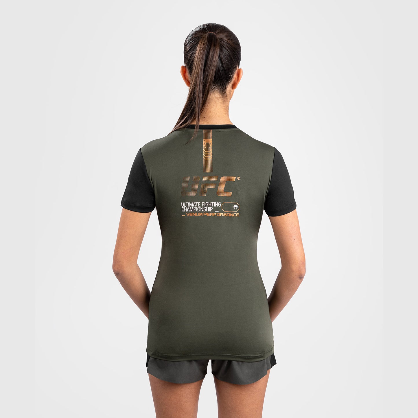 UFC Adrenaline by Venum Fight Week ウィメンズ・ドライテックTシャツ - カーキ/ブロンズ