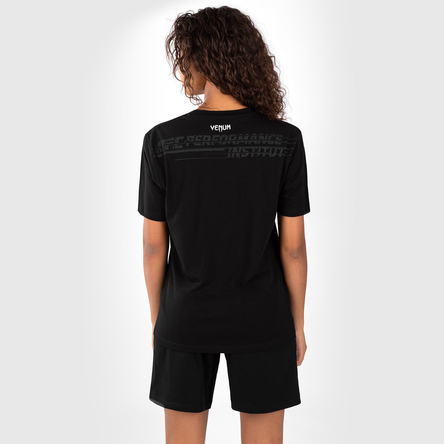 UFC Venum Performance Institute 2.0 女性用Tシャツ - ブラック/レッド