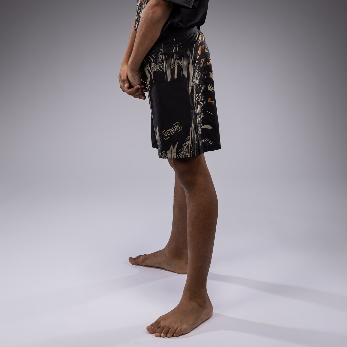 Venum Tiger キッズ ファイトショーツ - ブラック/ネオンオレンジ