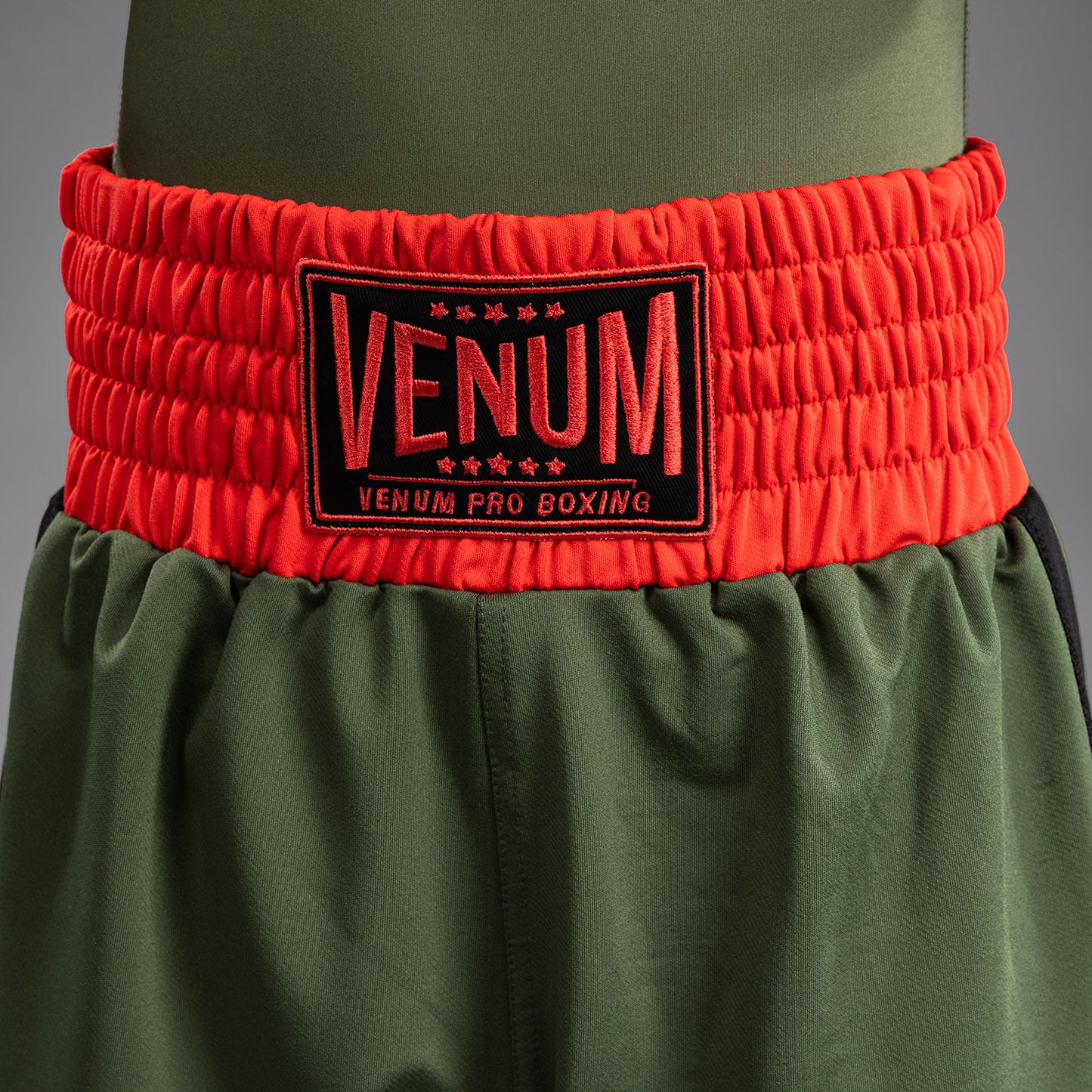 Venum Classic キッズ ボクシングショーツ - アーミーグリーン/オレンジ
