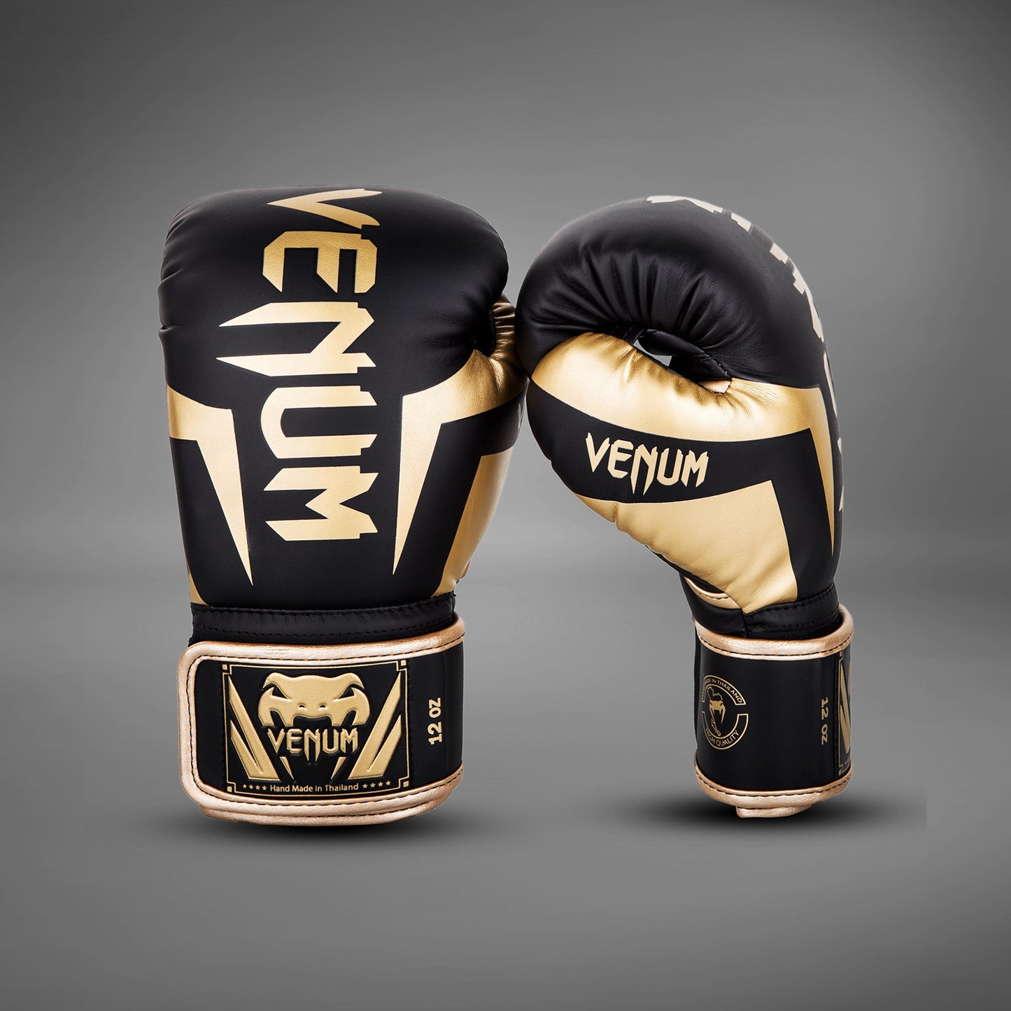 Venum Elite ボクシンググローブ：ブラック／ゴールド