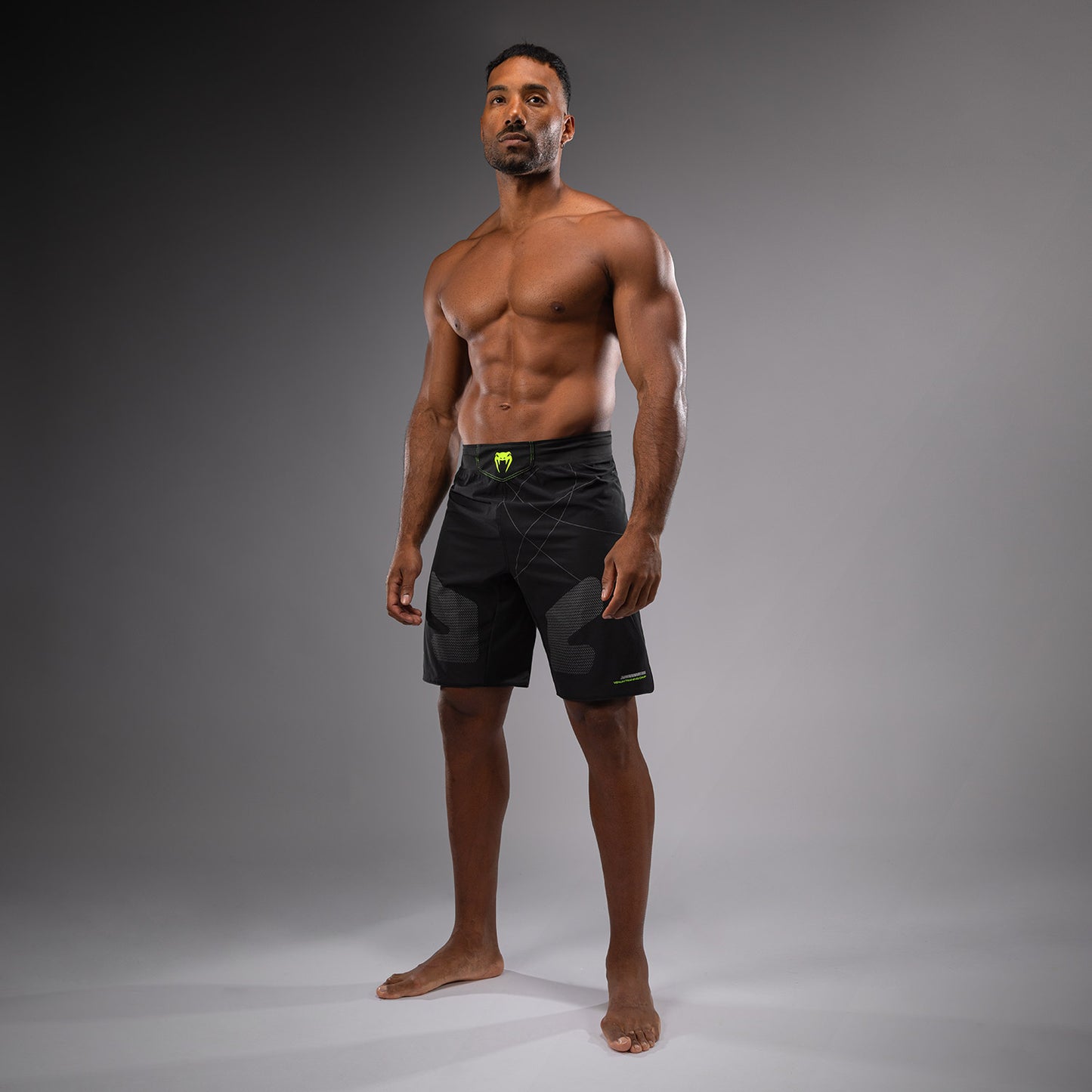 Venum Training Camp 4.0 メンズ・ファイトショーツ - ブラック／ネオングリーン