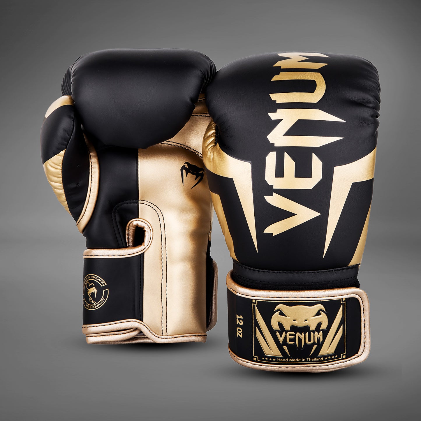 Venum Elite ボクシンググローブ：ブラック／ゴールド